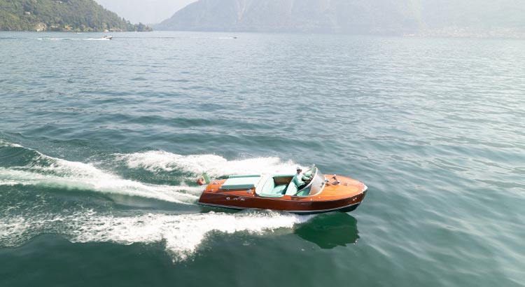 Riva Ariston Dorama luxury wooden boat sailing in Lake Como