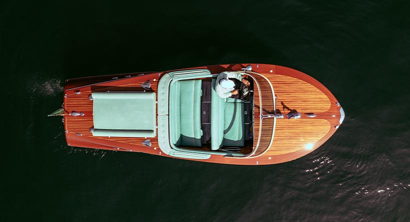 Riva Ariston Dorama luxury wooden boat sailing in Lake Como