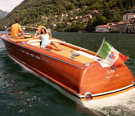 Riva Super Aquarama luxury wooden boat on Lake Como